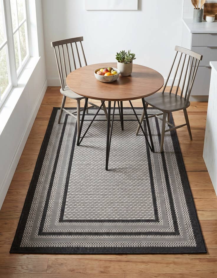 Detail image of 3' 3 x 5' Easy-Clean Border Indoor / Outdoor Rug
