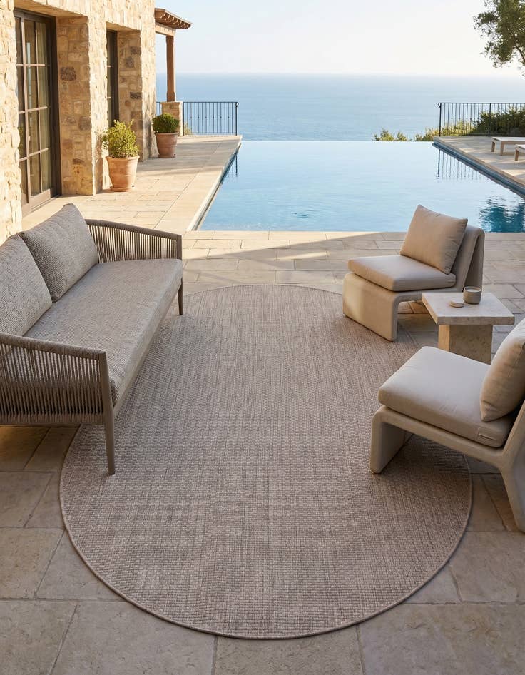 Detail image of 5' 3 x 8' Easy-Clean Solid Indoor / Outdoor Oval Rug