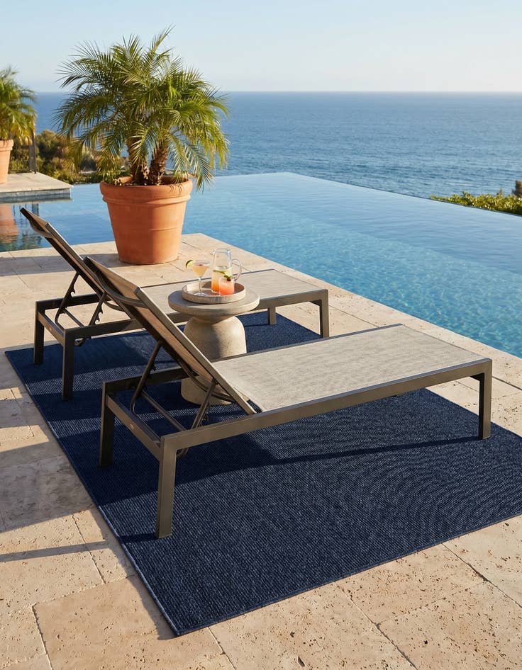 Detail image of 4' 1 x 6' 1 Easy-Clean Solid Indoor / Outdoor Rug