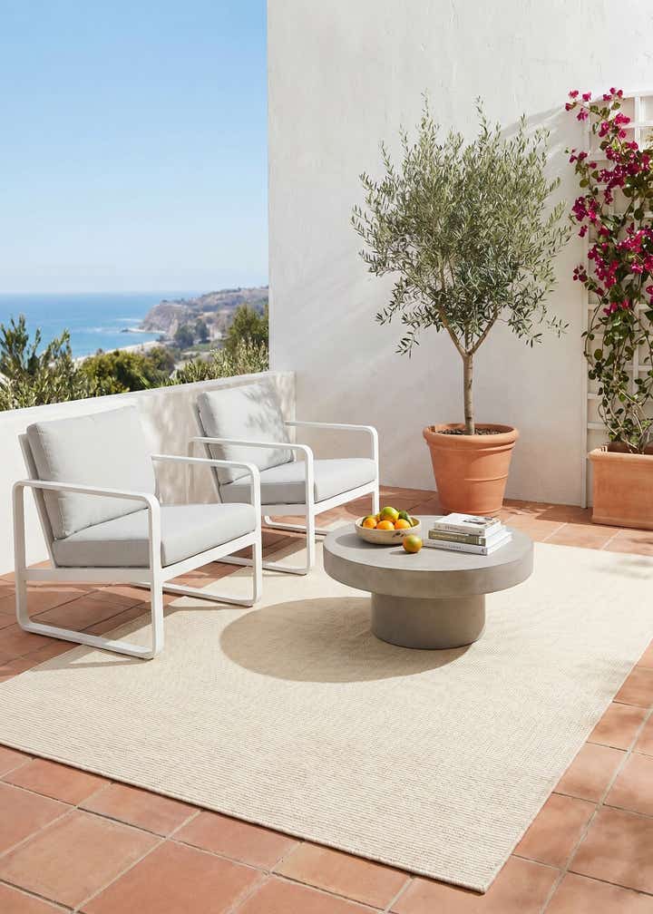 6' 1 x 9' Easy-Clean Jill Zarin Palm Springs Indoor / Outdoor Rug