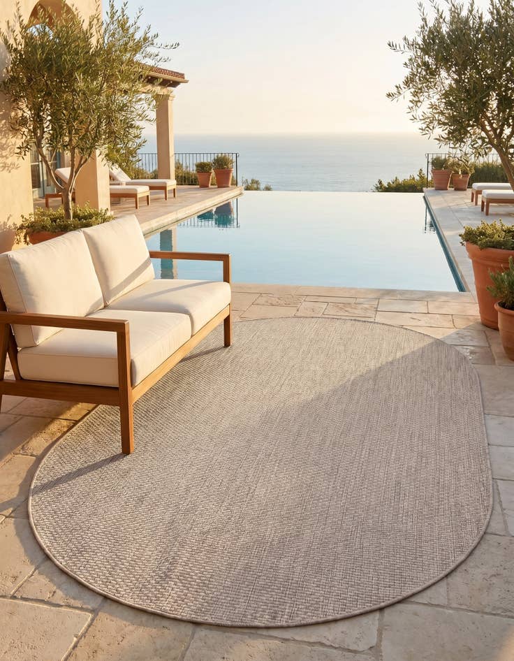 Detail image of 5' 3 x 8' Easy-Clean Solid Indoor / Outdoor Oval Rug