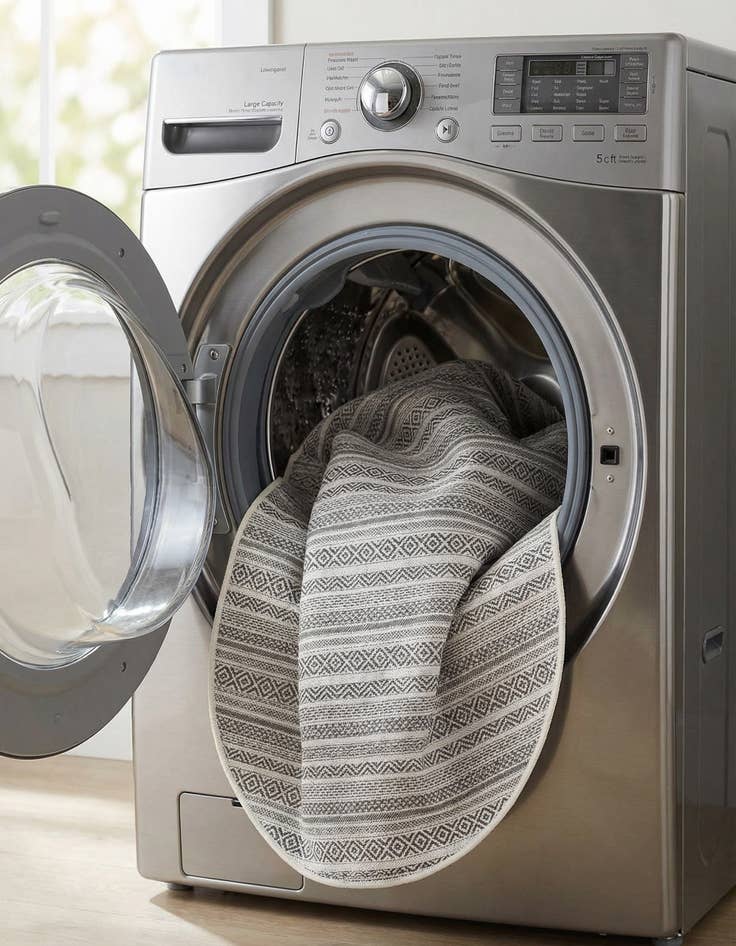 Detail image of 5' 3 x 8'  Washable Striped Indoor / Outdoor Oval Rug