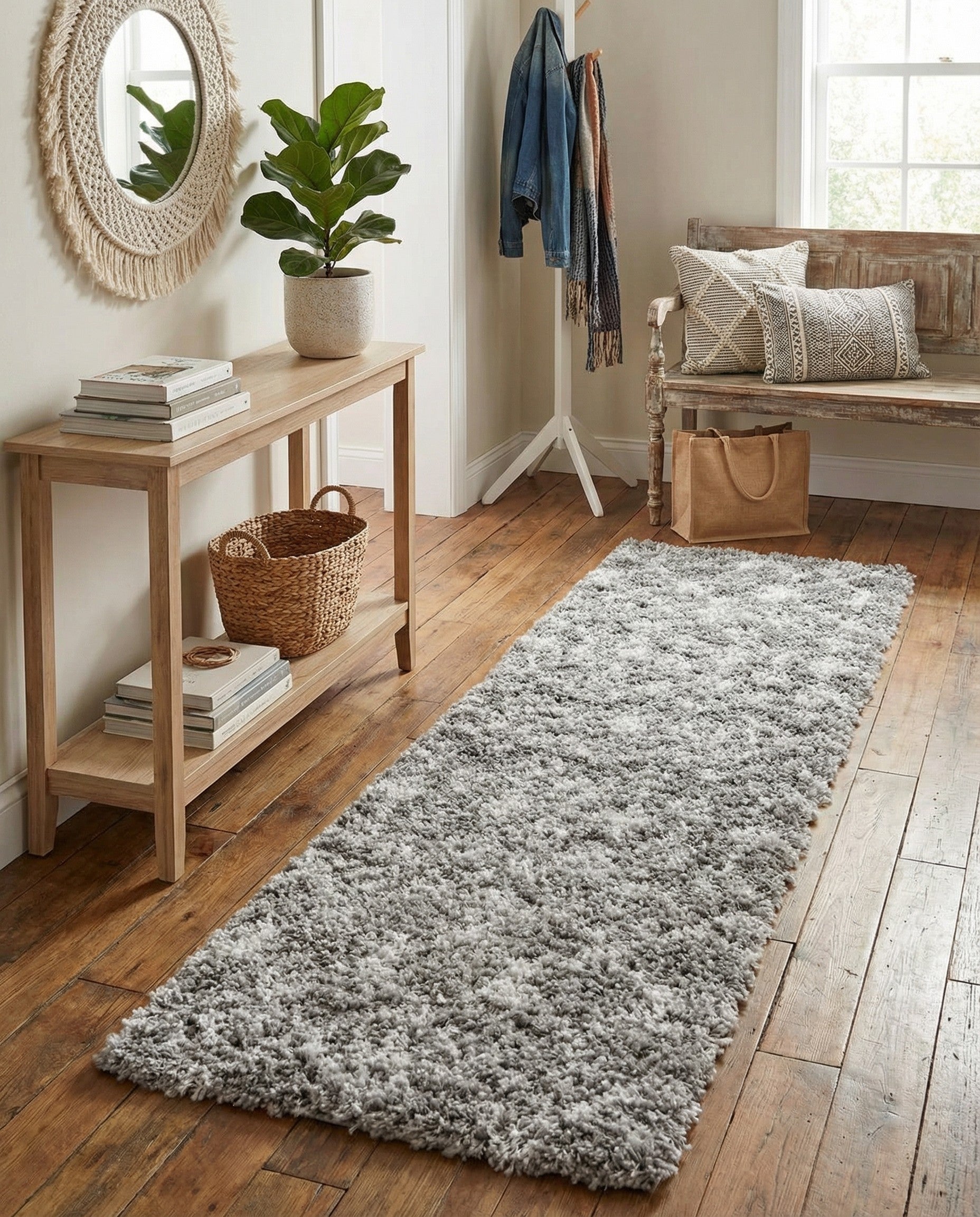 A 6 ft runner rug featuring a gray and off-white tribal trellis pattern with a plush shag pile.