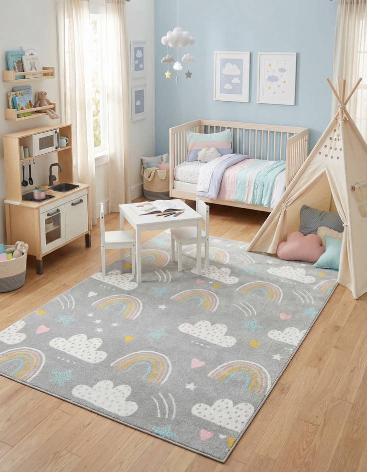 Detail image of  5' 3 x 8' Clouds and Rainbows Whimsy Kids Rug