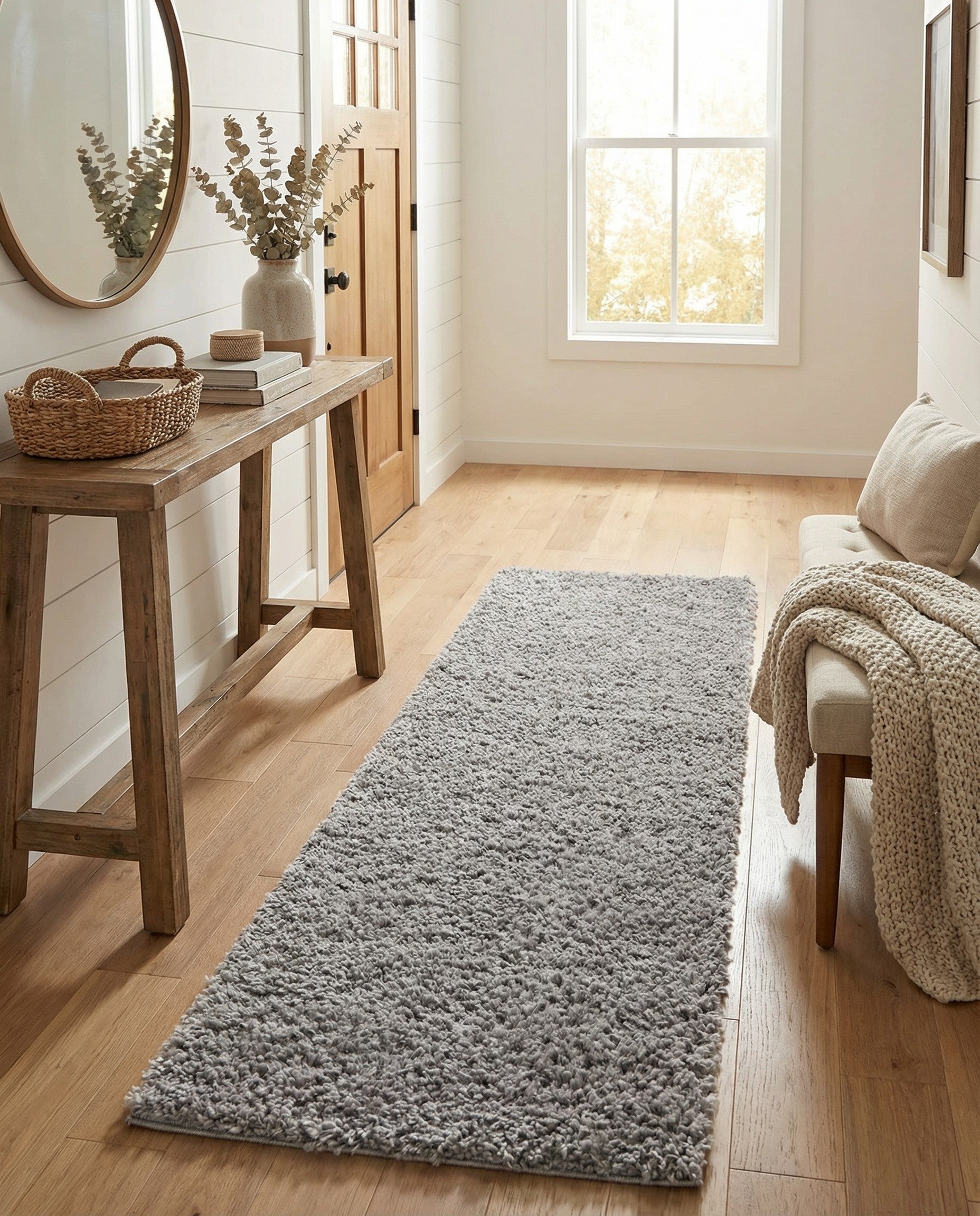 A soft, plush gray shag runner rug, 7 ft long, perfect for adding comfort and warmth to a hallway.