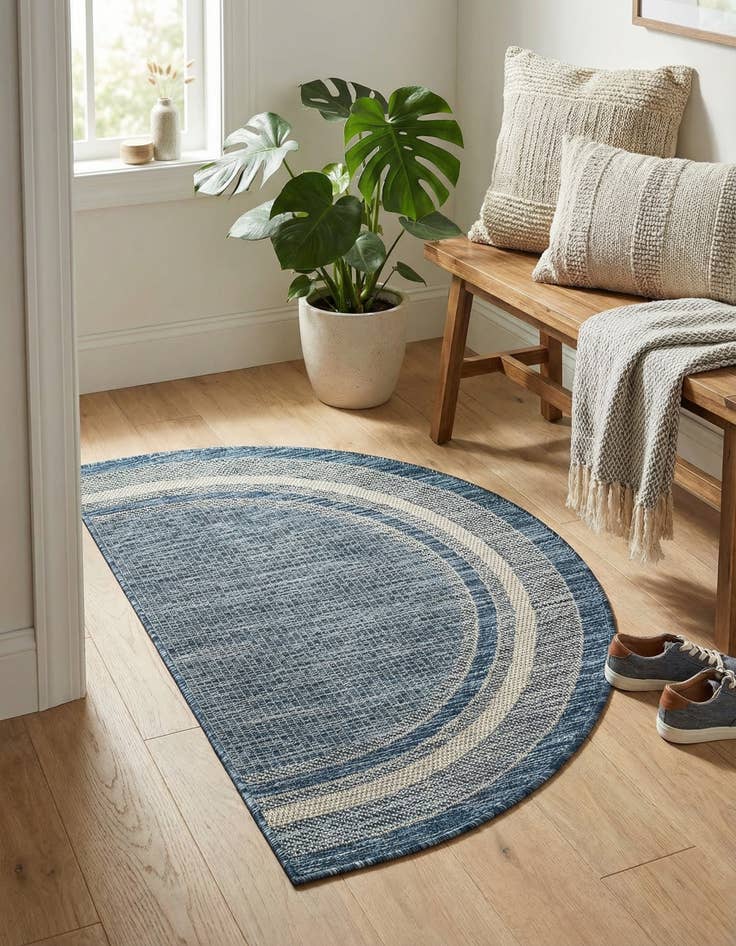Detail image of 2' 2 x 3' 7  Washable Border Indoor / Outdoor Hearth Rug