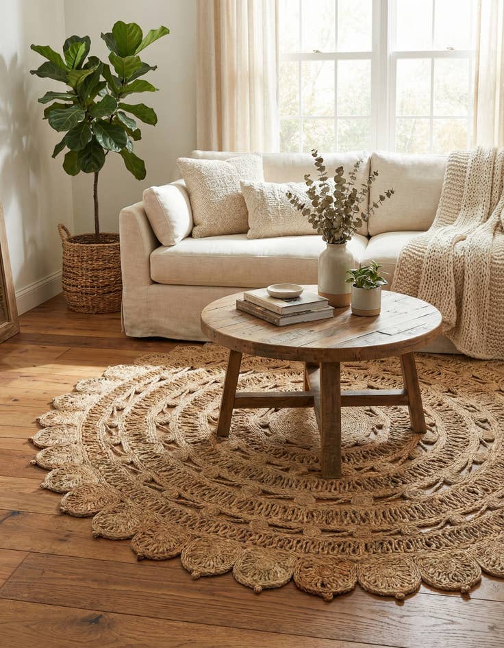 Detail image of  6' 1 x 6' 1  Hand Braided Jute Round Rug