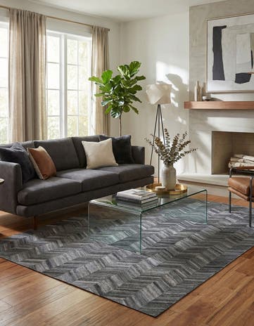 5' 2 x 8' 1 Cowhide Rug