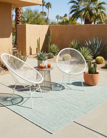 4' 1 x 6' 1 Easy-Clean Jill Zarin Palm Springs Indoor / Outdoor Rug