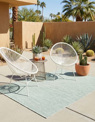 4' 1 x 6' 1 Easy-Clean Jill Zarin Palm Springs Indoor / Outdoor Rug