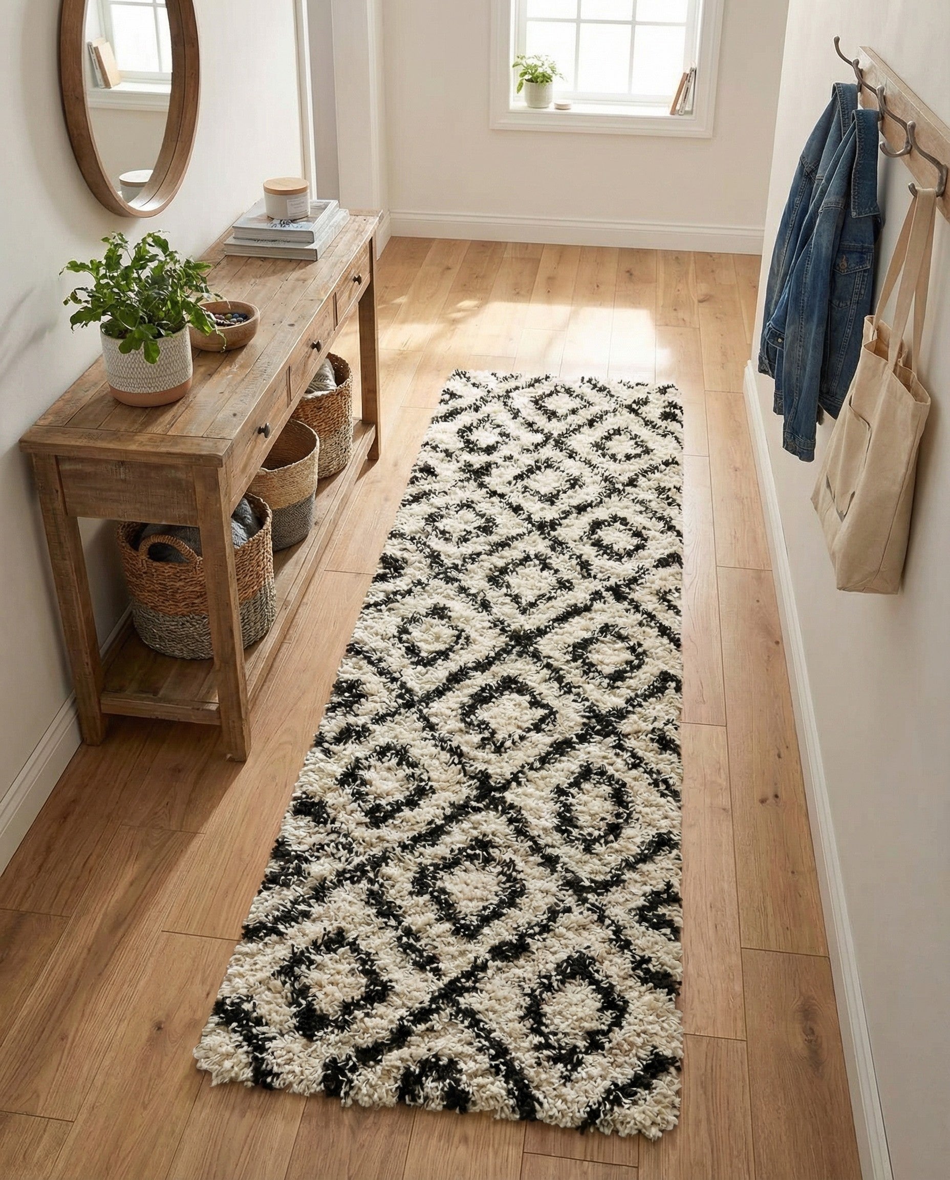 A black and ivory modern shag runner rug with a diamond lattice pattern, ideal for a hallway.