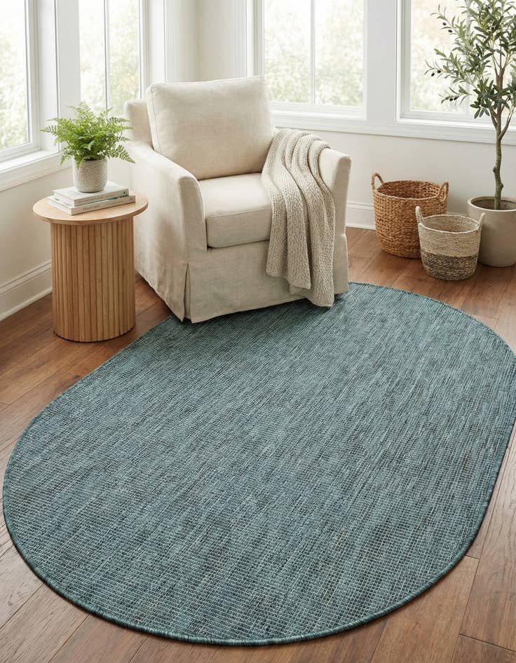 Detail image of 4' 1 x 6' 1 Easy-Clean Solid Indoor / Outdoor Oval Rug