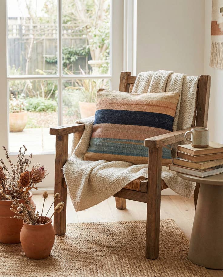 Detail image of 1' 7 x 1' 8 Hand Woven Pillow Wool Square Rug