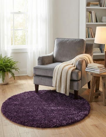 Violet Solid Frieze Round Rug
