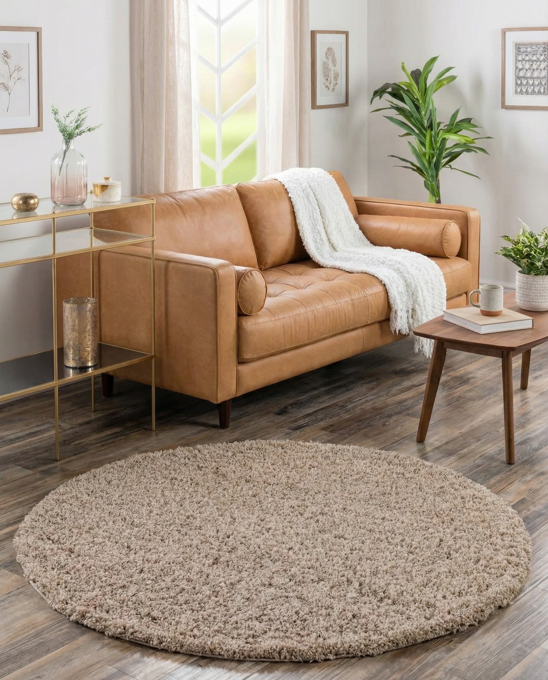 A 3' 0 x 3' 0 round Solid Shag rug in a mix of brown, tan, and cream hues, showcasing its plush, textured pile.