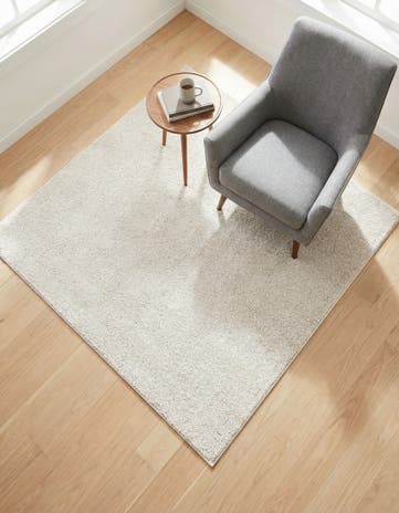 Ivory Solid Frieze Square Rug