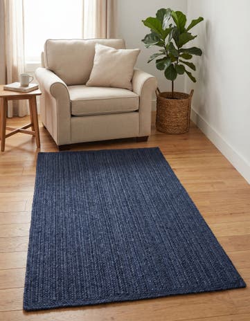 4' 1 x 6' 1 Handmade Braided Jute Rug