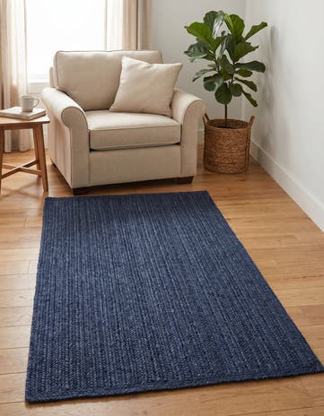 4' 1 x 6' 1 Handmade Braided Jute Rug