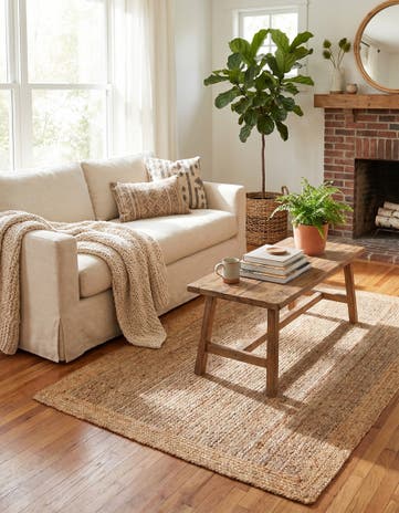 4' 1 x 6' 1 Handmade Braided Jute Rug
