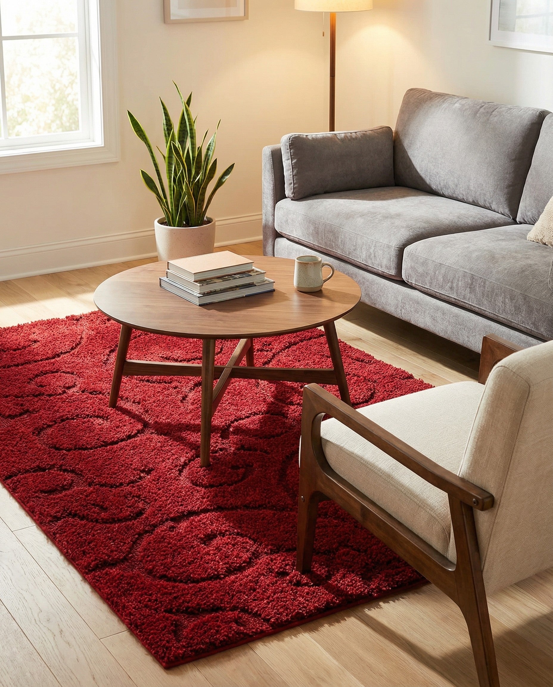 A vibrant 3x5 rectangular red shag rug with a subtle floral pattern, perfect for adding warmth to any indoor space.