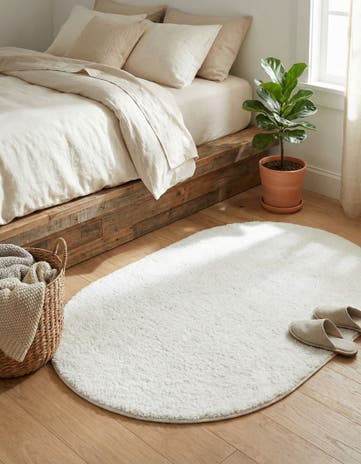 Snow White Solid Frieze Oval Rug