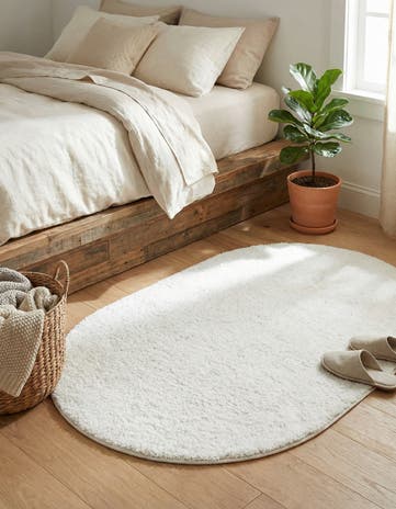 Snow White Solid Frieze Oval Rug