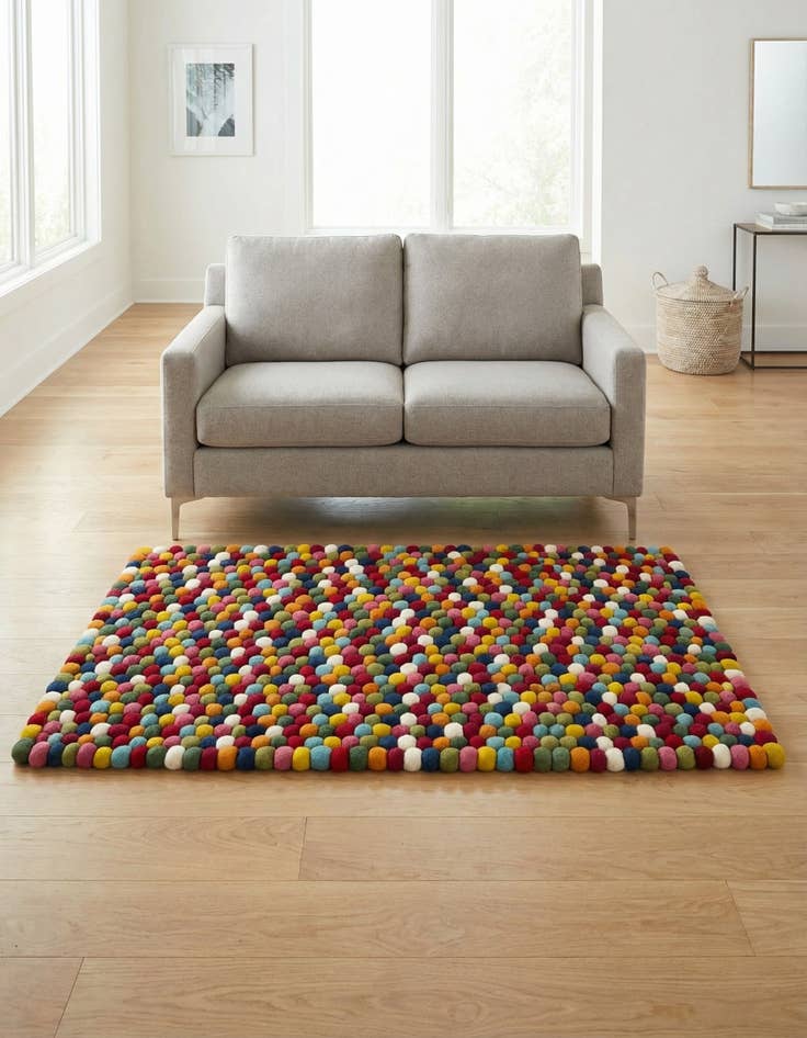 Detail image of  3' 3 x 5' 3 Felt Ball Wool Rug