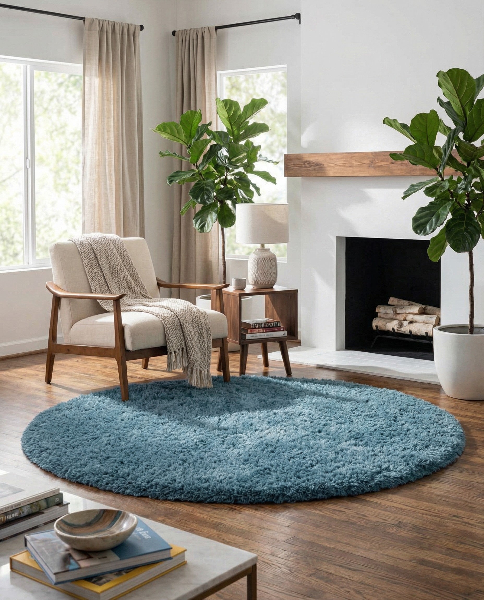 A soft, plush 6' 7 x 6' 7 round blue shag rug with a textured pile, ideal for indoor spaces.
