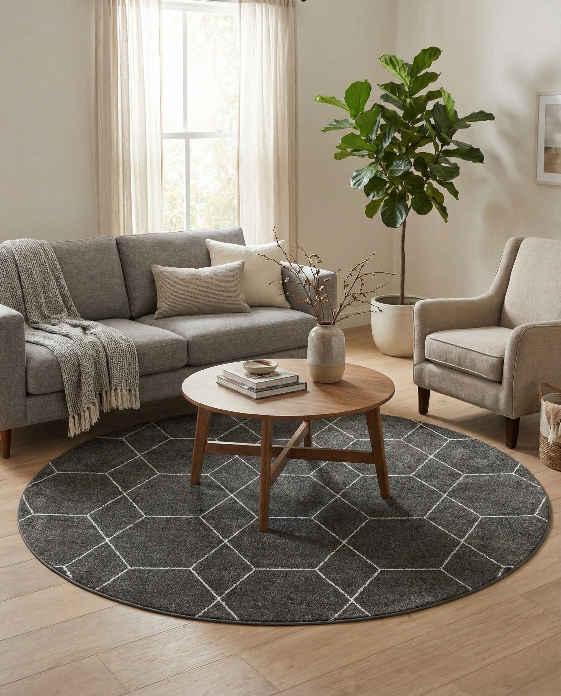 A 7' 10 round gray area rug with a modern white trellis pattern, suitable for indoor spaces.