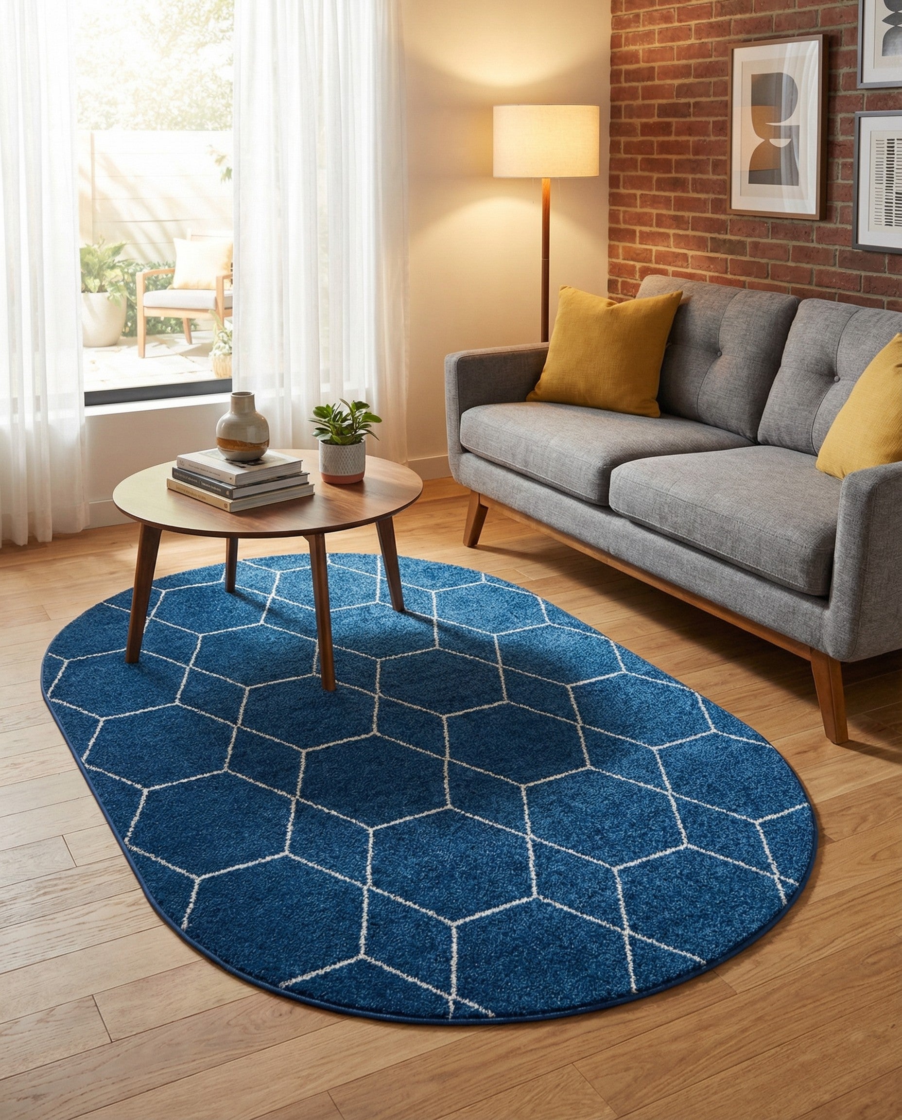 A 3' 0 x 5' 3 oval navy blue rug with a white modern trellis pattern, suitable for indoor spaces.