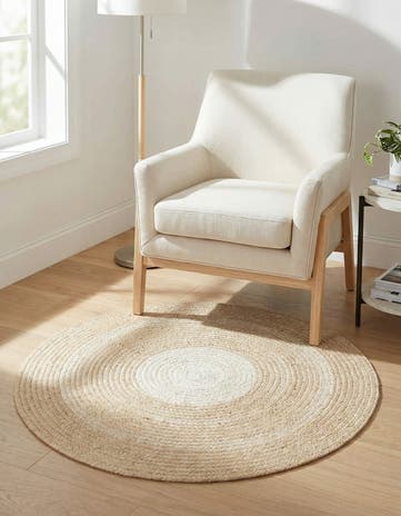 Ivory Handmade Hand Braided Wool Round Rug