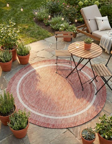 5' 3 x 5' 3 Easy-Clean Border Indoor / Outdoor Round Rug