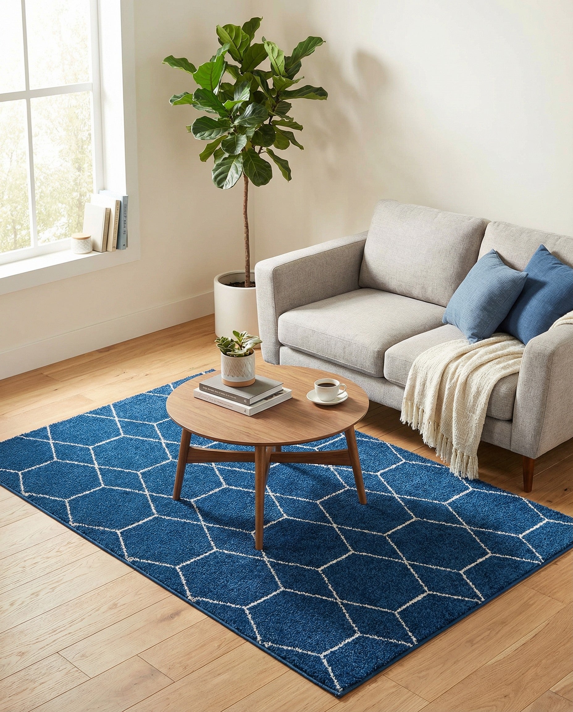 A 3x5 rectangular navy blue modern rug with a white geometric trellis pattern, suitable for a kitchen or entryway.