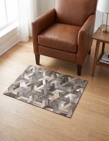 2' 1 x 3' Cowhide Rug