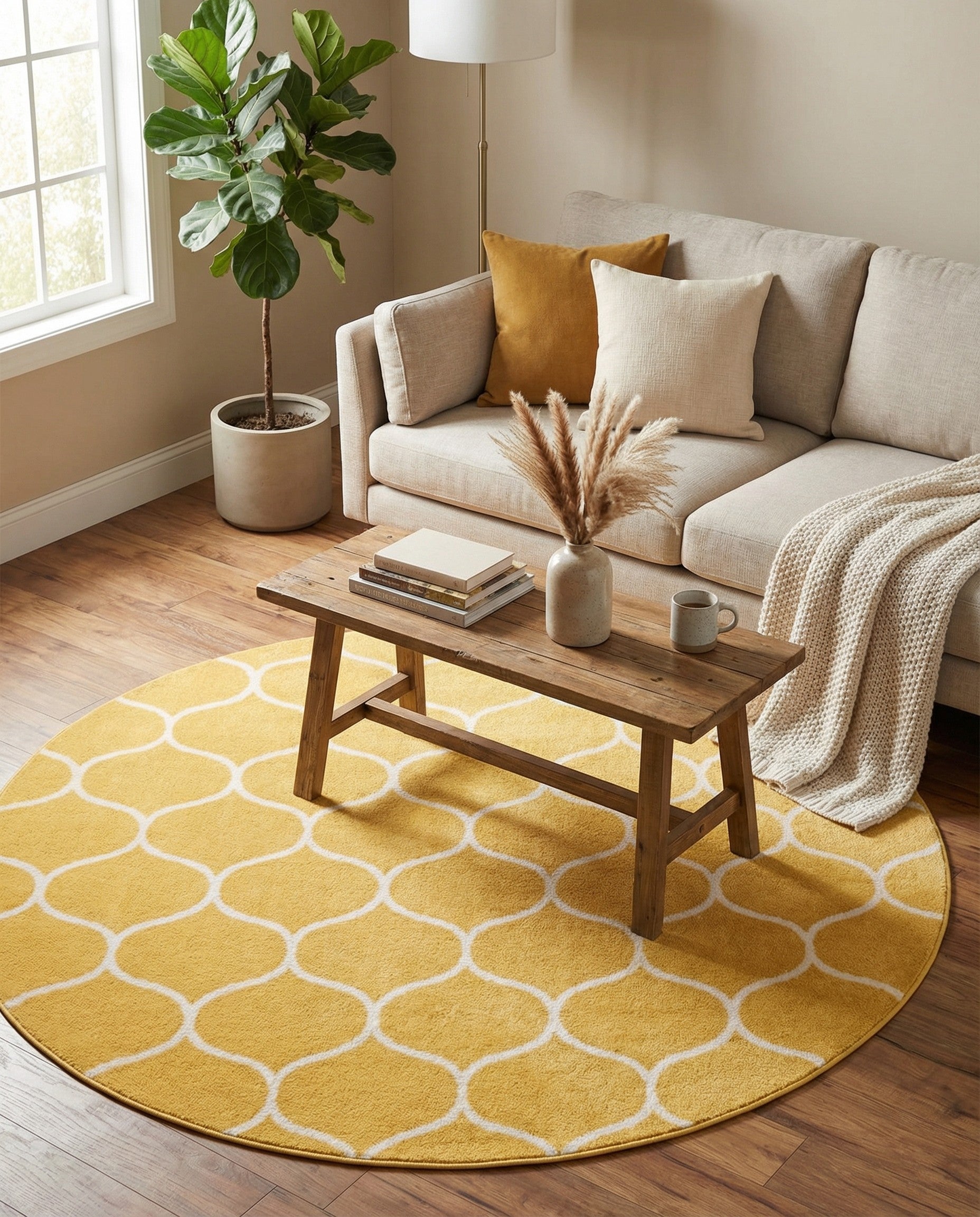 A 5' 3 round yellow area rug with a white modern trellis pattern, suitable for indoor spaces.