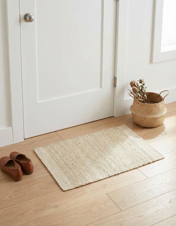 Ivory and White Hand Woven Lariat Rug