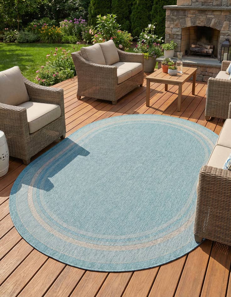 Detail image of 7' 10 x 10' Easy-Clean Border Indoor / Outdoor Oval Rug