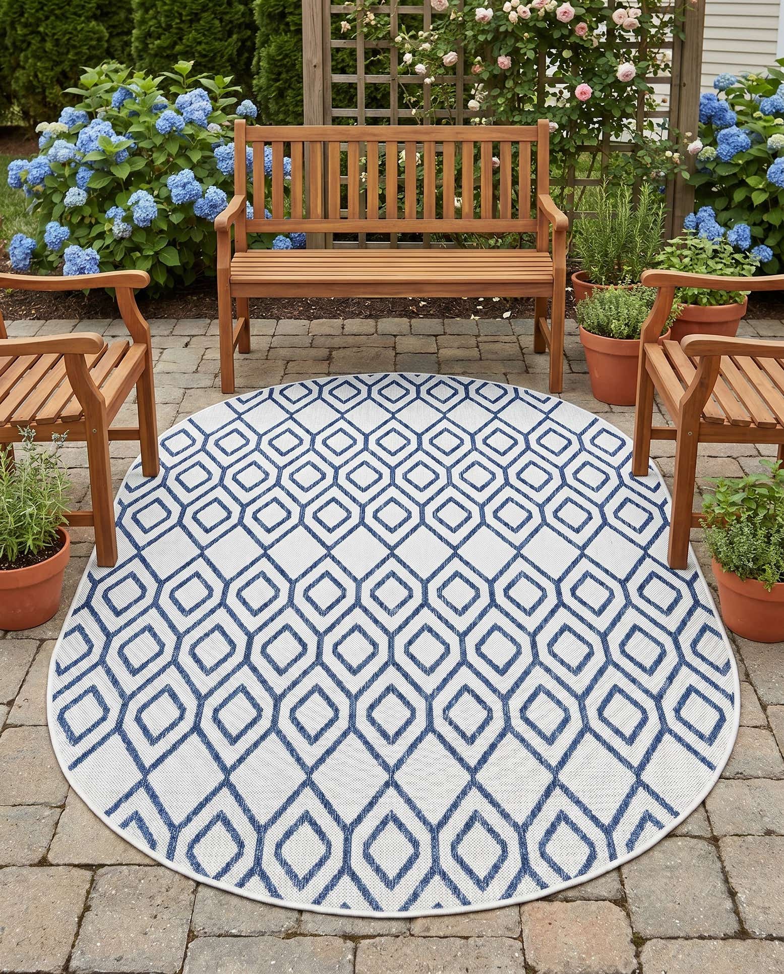 5' 3 x 8' Easy-Clean Jill Zarin Indoor / Outdoor Oval Rug