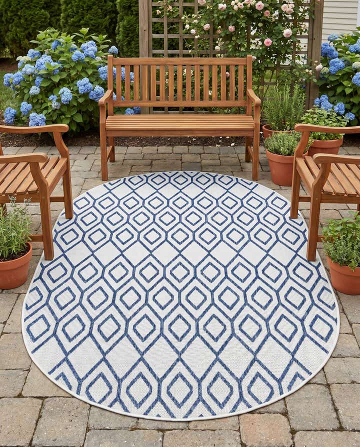 5' 3 x 8' Easy-Clean Jill Zarin Indoor / Outdoor Oval Rug