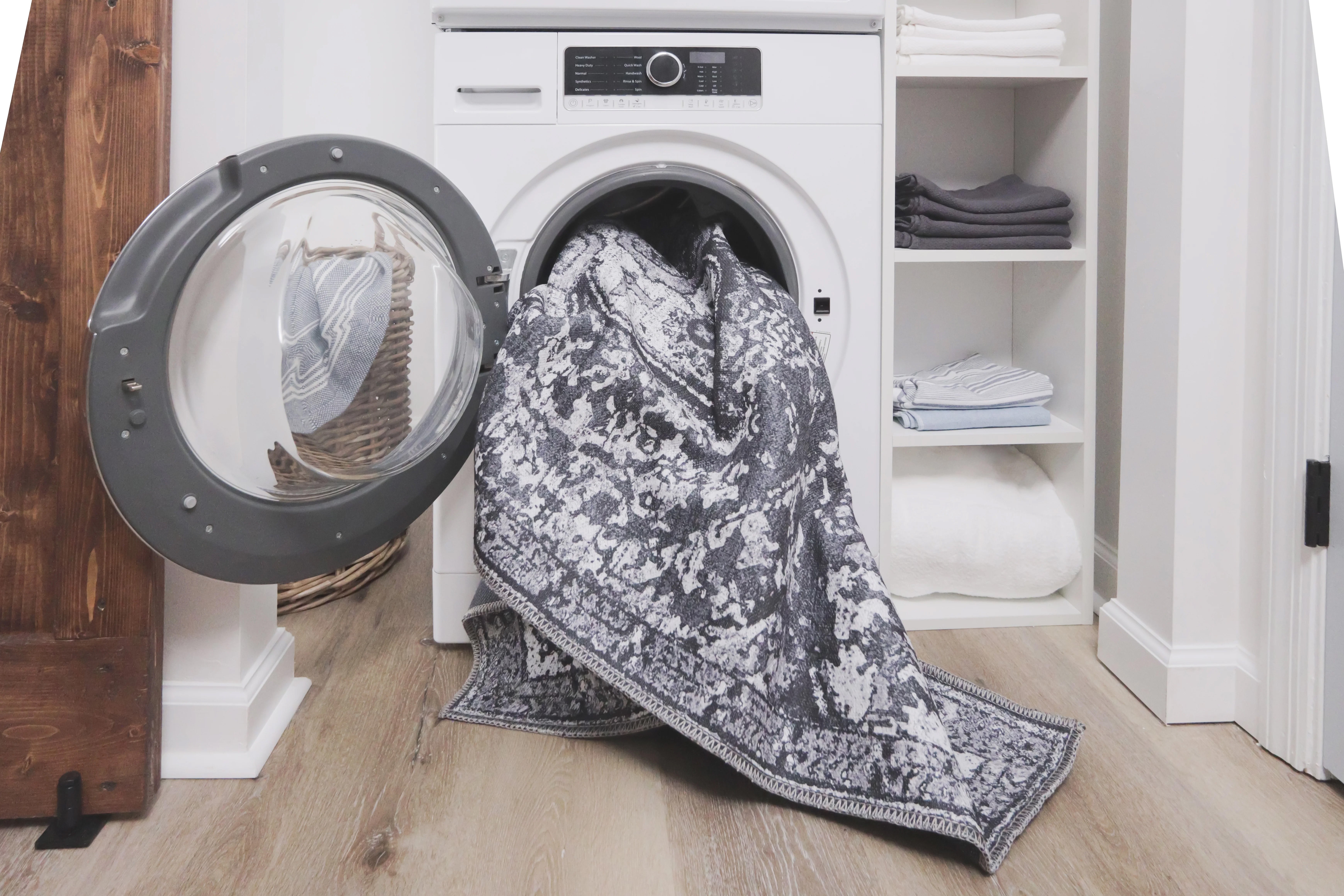 Rug being loaded into washing machine